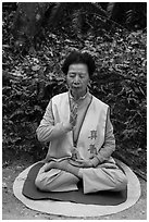 Woman meditating. Sun Moon Lake, Taiwan ( black and white)