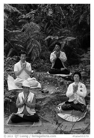 Members of religious sect in meditation. Sun Moon Lake, Taiwan (black and white)