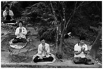 Group meditating in forest. Sun Moon Lake, Taiwan (black and white)