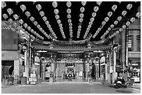 Temple and red paper lanterns at night. Lukang, Taiwan ( black and white)