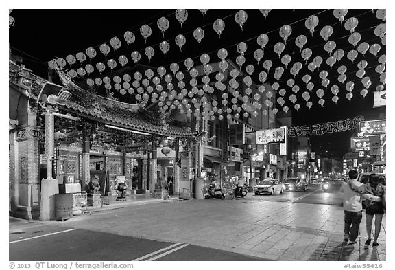 Street at night with temple and red paper lanterns. Lukang, Taiwan