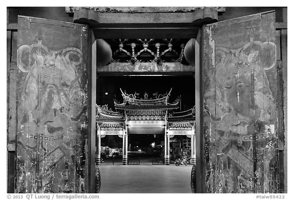 Painted doors, looking towards gate at night, Tienhou Temple. Lukang, Taiwan