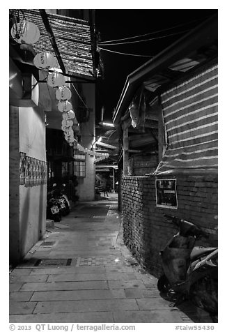 Chinseng Lane at night with lanterns. Lukang, Taiwan (black and white)