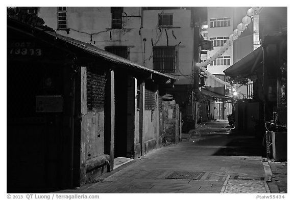 Old houses and lanterns on Chinseng Lane at night. Lukang, Taiwan (black and white)