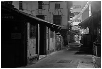 Old houses and lanterns on Chinseng Lane at night. Lukang, Taiwan (black and white)