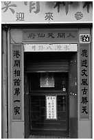 Purple doorway with red and yellow banners. Lukang, Taiwan ( black and white)