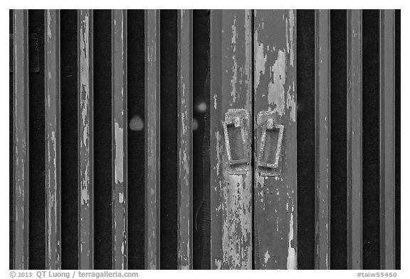 Red lights seen through door. Lukang, Taiwan (black and white)