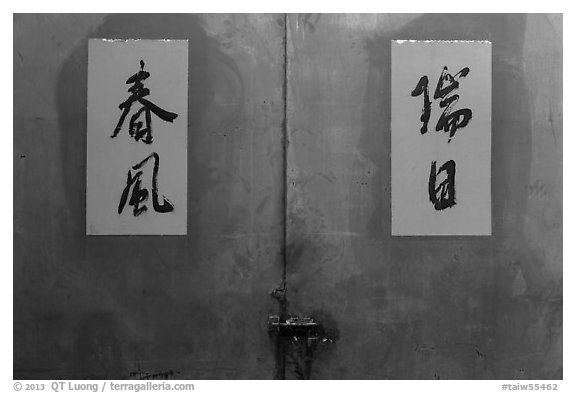 Blue door detail wiht Chinese script on red. Lukang, Taiwan