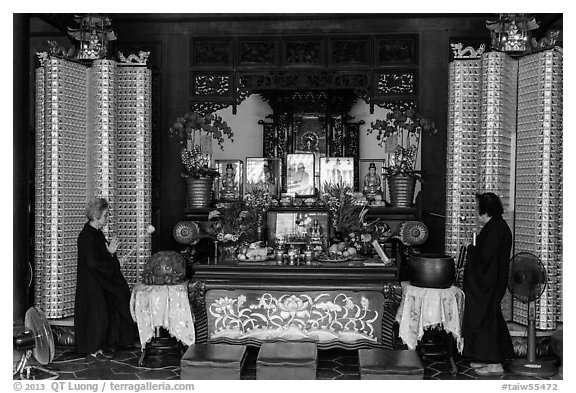 Main hall altar during buddhist service, Longshan Temple. Lukang, Taiwan (black and white)