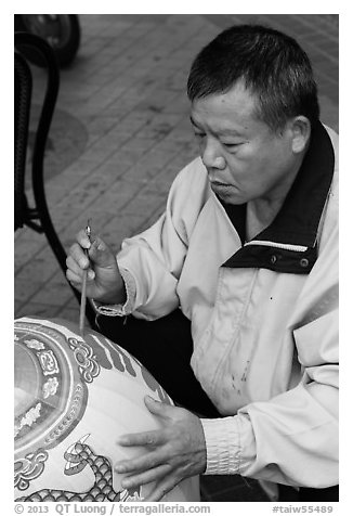 Man painting paper lantern. Lukang, Taiwan (black and white)