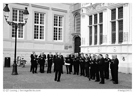 Choir singing on the Burg. Bruges, Belgium (black and white)