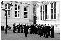 Choir singing on the Burg. Bruges, Belgium (black and white)