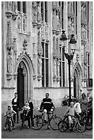 People standing on the Burg, in front of the Stadhuis. Bruges, Belgium (black and white)