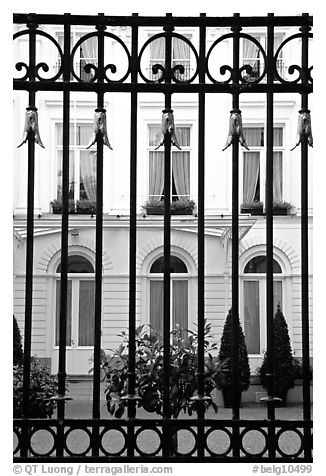 Palace and forged metal gates. Bruges, Belgium (black and white)