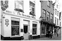 Street with chocolate shop. Bruges, Belgium (black and white)