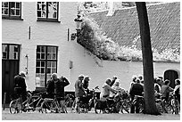 Bicylists in Courtyard of the Begijnhof. Bruges, Belgium (black and white)