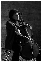 Woman cellist. Bruges, Belgium (black and white)