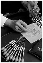 Hands of a lacemaker at work. Bruges, Belgium (black and white)