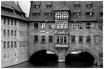 House built accross the river. Nurnberg, Bavaria, Germany ( black and white)