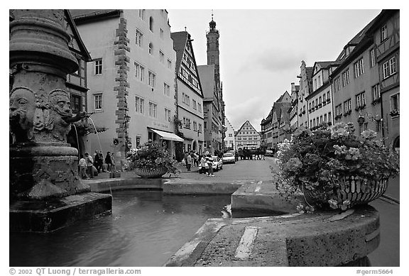 Fountain and street. Rothenburg ob der Tauber, Bavaria, Germany (black and white)