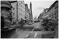 Fountain and street. Rothenburg ob der Tauber, Bavaria, Germany (black and white)