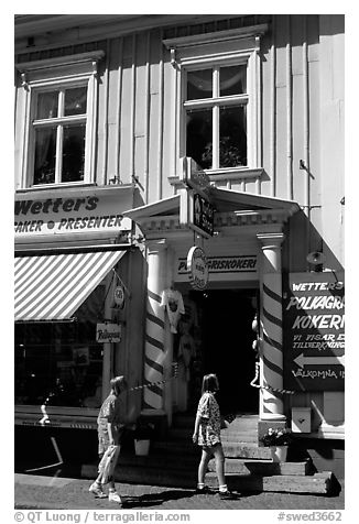 Kids in front of candy store in Granna. Gotaland, Sweden (black and white)