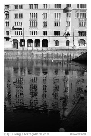 Reflections of buildings on Riddarfjarden. Stockholm, Sweden (black and white)