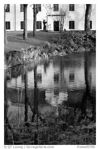 Building reflected in a lake, Skansen. Stockholm, Sweden (black and white)