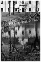 Building reflected in a lake, Skansen. Stockholm, Sweden (black and white)