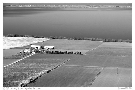 Fields bordering lake Vattern near Granna. Gotaland, Sweden