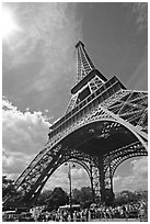 Eiffel tower and sun with crowds at base. Paris, France (black and white)