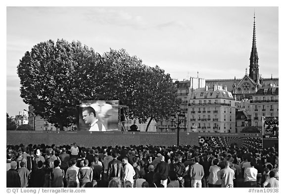 Crowds watch a broadcast of a soccer match near Hotel de Ville. Paris, France (black and white)