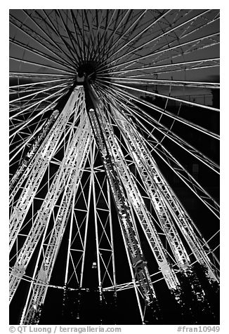 Lighted Ferris wheel in the Tuileries garden. Paris, France (black and white)