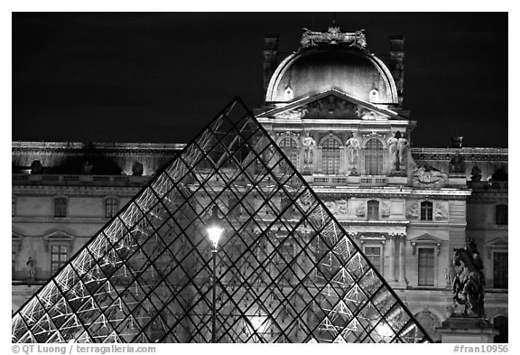 Pyramid and Louvre at night. Paris, France (black and white)