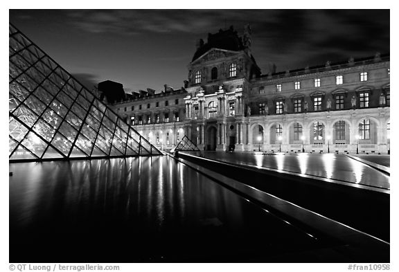 Basin, Pyramid, and Louvre at dusk. Paris, France (black and white)