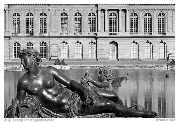 Statue, basin, and facade, afternoon, Palais de Versailles. France (black and white)