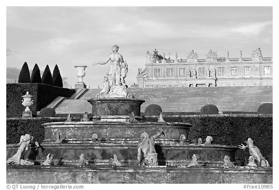 Fountain in the Versailles palace extensive gardens. France (black and white)