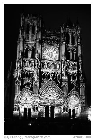 Cathedral facade laser-illuminated at night to recreate original colors, Amiens. France (black and white)