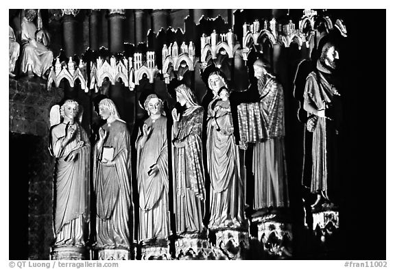 Sculptures laser-illuminated at night to recreate original colors, Amiens. France (black and white)