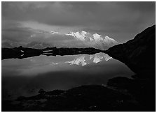 Mont Blanc range reflected in pond at sunset, Chamonix. France (black and white)