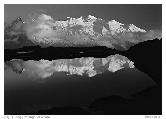 Mont Blanc reflected in pond at sunset, Chamonix. France (black and white)