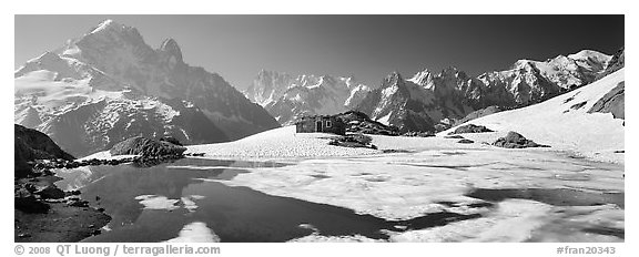 Partly Frozen Lac Blanc, Aiguille Verte, and Mont-Blanc range, Chamonix. France (black and white)