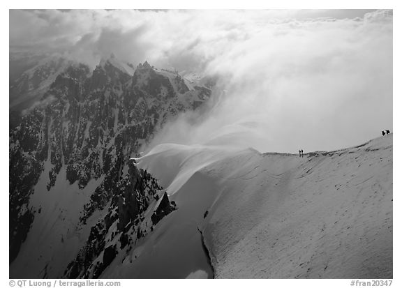 Alpinists on Aiguille du Midi ridge, Chamonix. France (black and white)