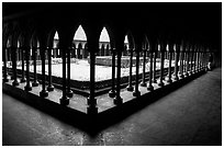 Cloister inside the Benedictine abbey. Mont Saint-Michel, Brittany, France (black and white)