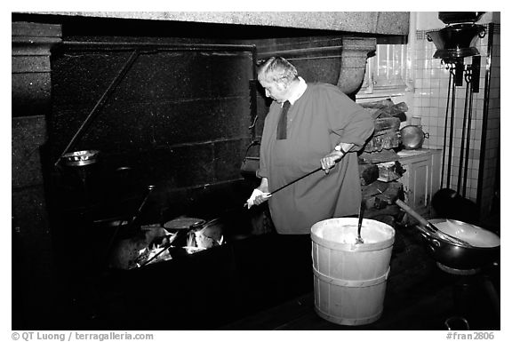 Baking the famous Omelette de la mere Poularde at the eponymous restaurant. Mont Saint-Michel, Brittany, France