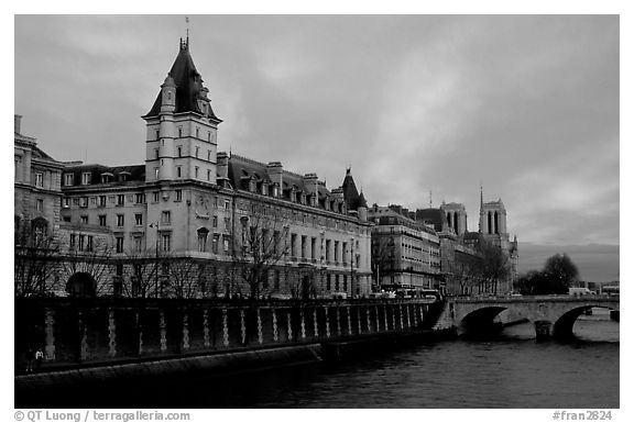 Conciergerie, Pont-au-change, and Ile de la Cite at sunset. Paris, France