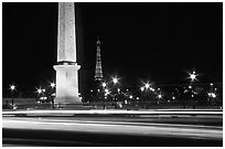 Luxor obelisk of the Concorde plaza and Eiffel Tower at night. Paris, France ( black and white)