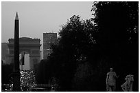 Obelisk of the Concorde and Arc de Triomphe at sunset. Paris, France (black and white)