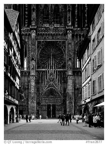Facade of the Notre Dame cathedral seen from nearby street. Strasbourg, Alsace, France (black and white)