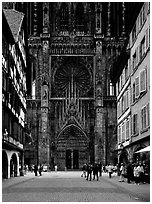 Facade of the Notre Dame cathedral seen from nearby street. Strasbourg, Alsace, France (black and white)